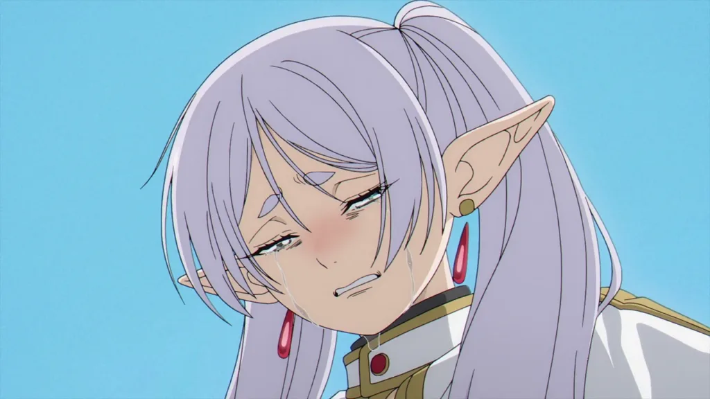 Frieren com expressão emocionada, em close, em uma cena do episódio 1.