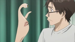 Shinichi conversando com Migi transformado em rosto na mão em Parasyte