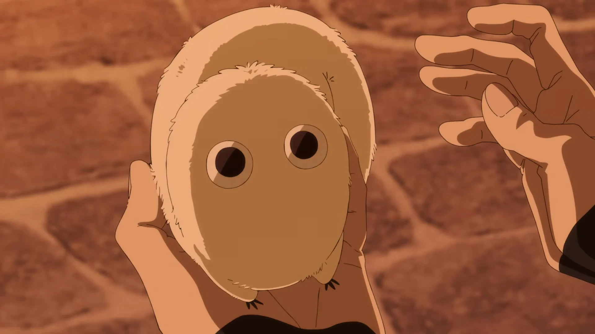 Brushbuddy em um frame oficial do anime Witch Hat Atelier