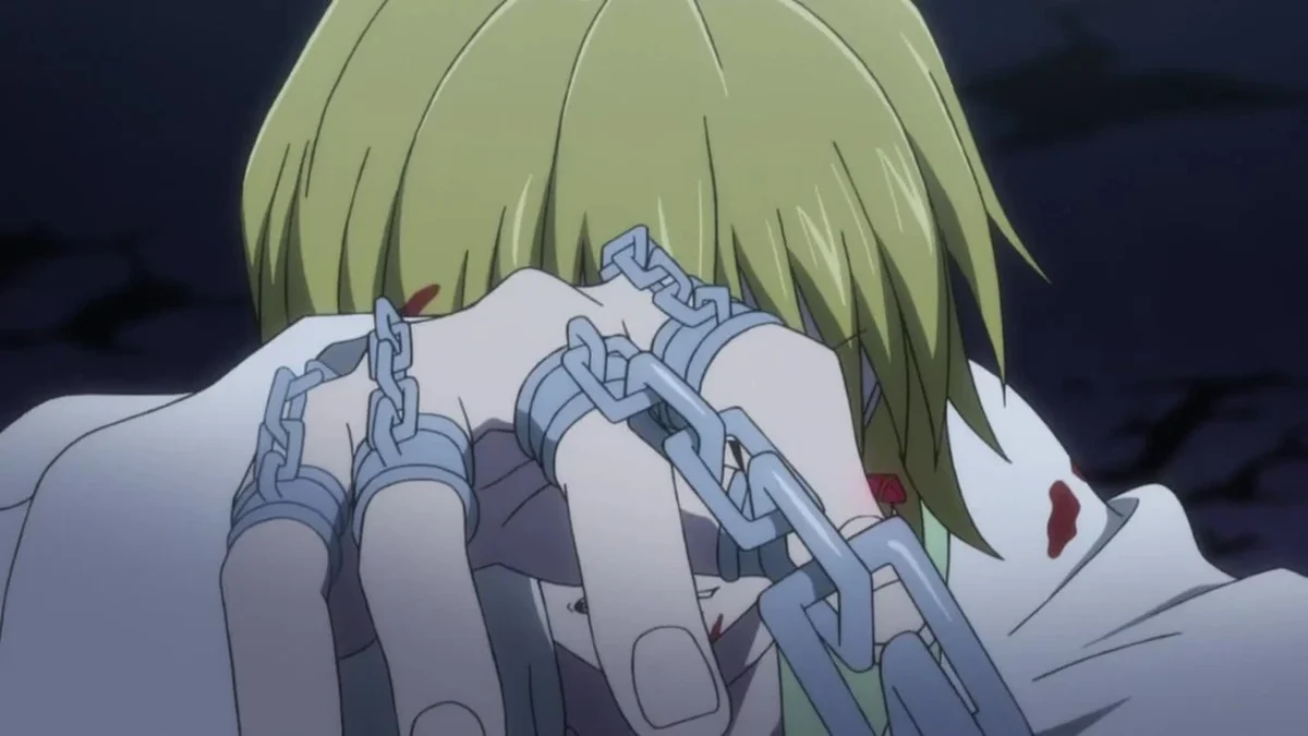 Kurapika segura suas correntes durante o confronto com Uvogin