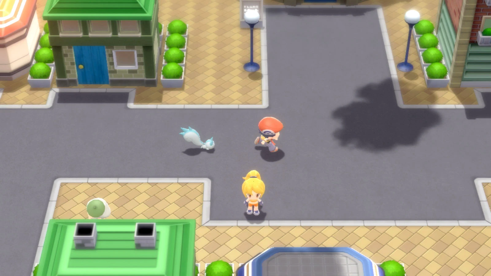 Treinador caminha por uma cidade de Sinnoh com um Pokémon fora da Poké Bola